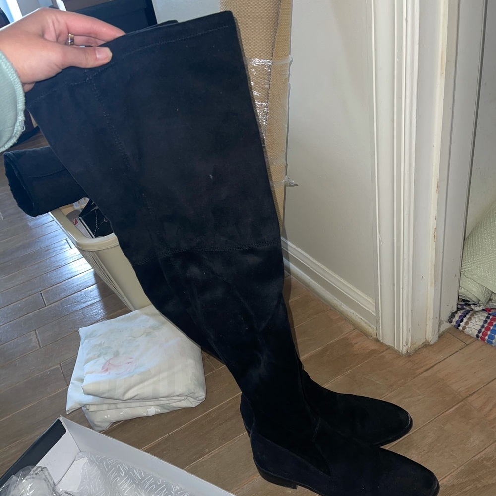 Over the knee black boots